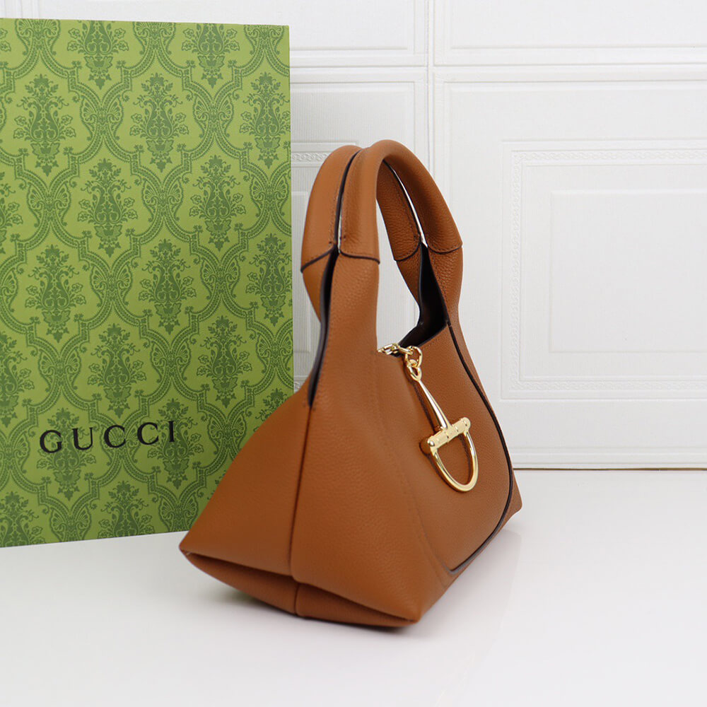 G*u*i softbit medium top handle bag