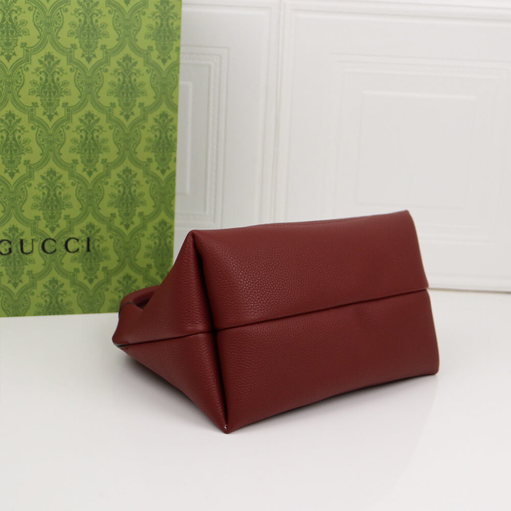G*u*i softbit medium top handle bag