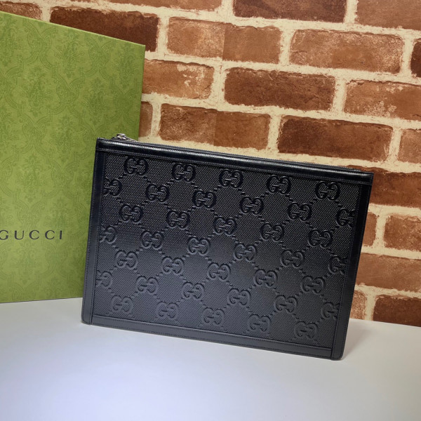 G*u*i gg embossed pouch