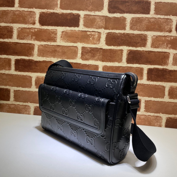 G*u*i gg embossed messenger bag