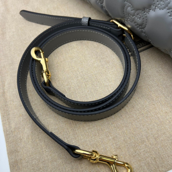 G*u*i gg matelassé leather top handle bag