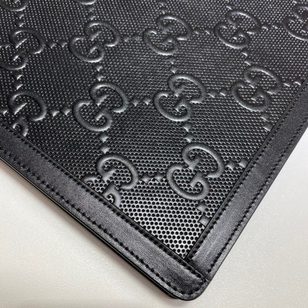 G*u*i gg embossed pouch