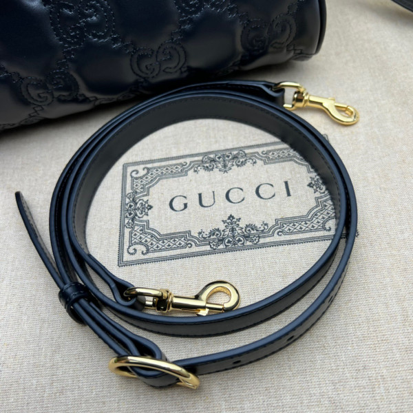 G*u*i gg matelassé leather top handle bag