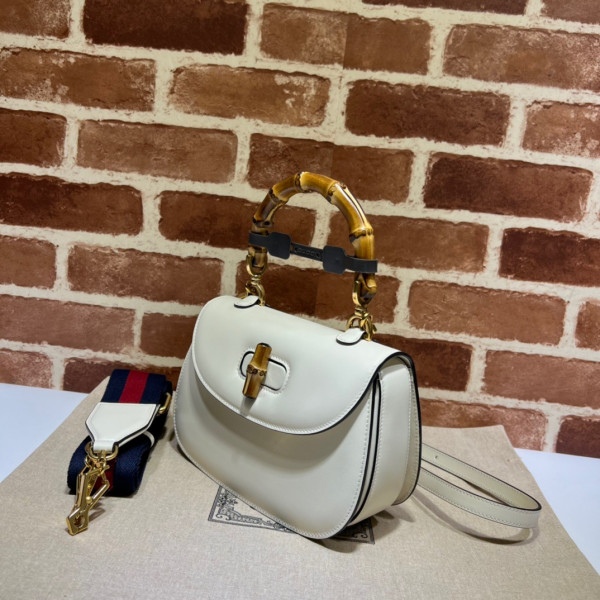 G*u*i small top handle bag with bamboo