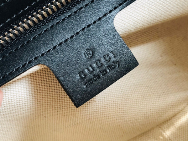 G*u*i gg shoulder bag with leather details