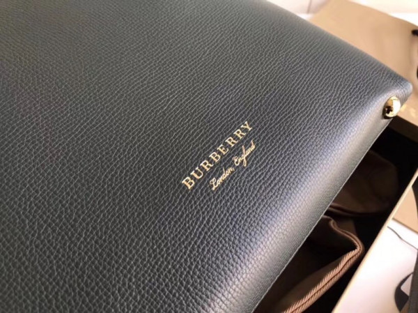 B**rry the small banner in leather and house check