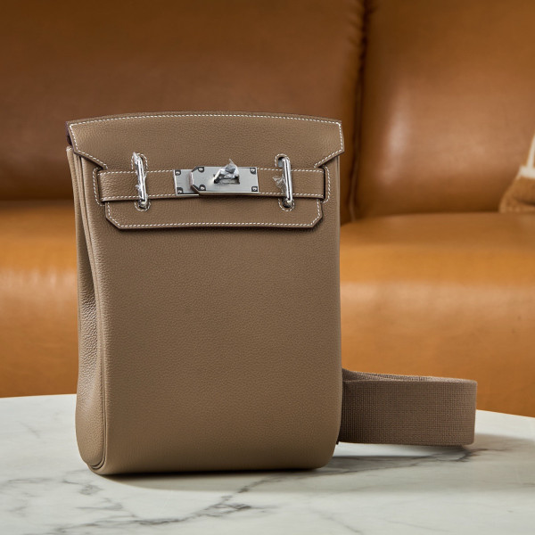 H**mes has a dos pm backpack togo leather