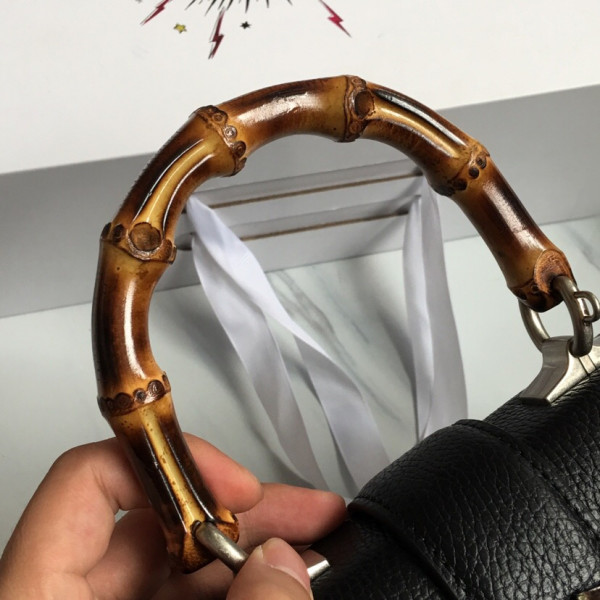 G*u*i bamboo bag