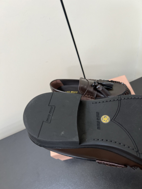 M*um*u loafers