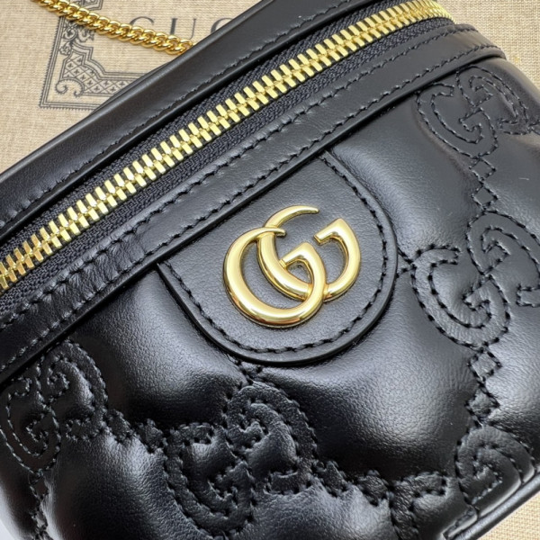 G*u*i gg matelassé top handle mini bag