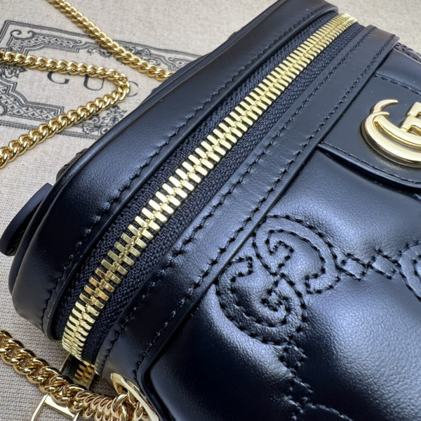 G*u*i gg matelassé top handle mini bag
