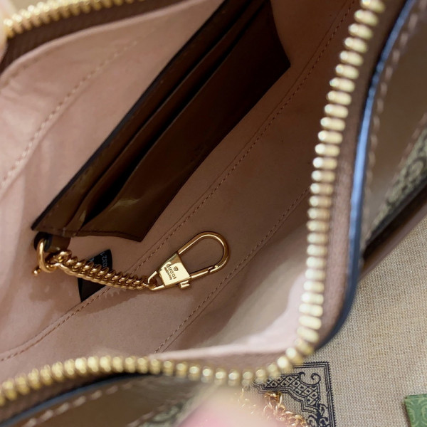 G*u*i half-moon-shaped mini bag with interlocking g