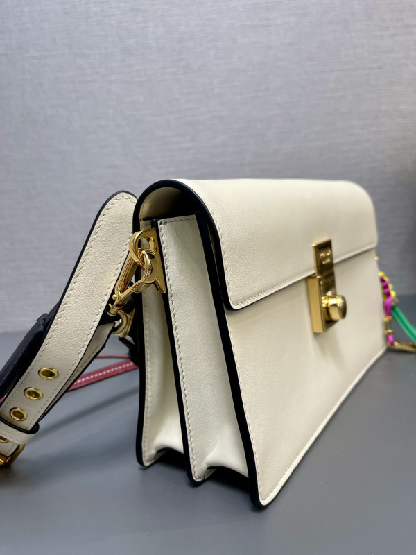 Pra*a soft sound small leather shoulder bag with charms