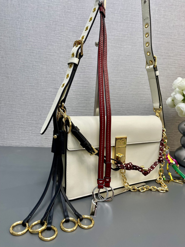 Pra*a soft sound small leather shoulder bag with charms