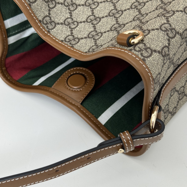 G*u*i gg emblem mini bucket bag