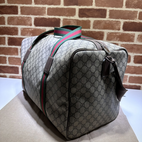G*u*i medium duffle bag with web